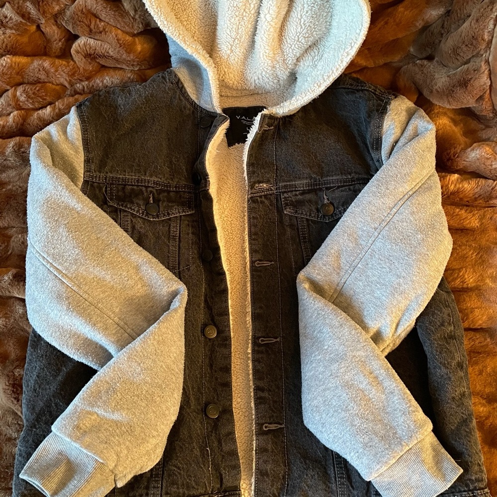Black Jean jacket with gray sleeves and hood